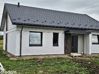 NOWOCZESNY DOM - 91 m² energooszczędnego komfortu bez zbędnych metrów.