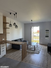 Nowoczesne mieszkanie na parterze z balkonem i wyposażeniem