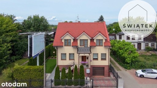 Dom wolnostojący z ogrodem i garażem