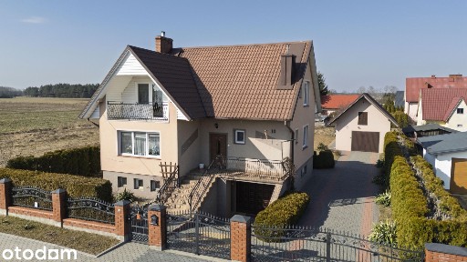 Komfortowy dom w Rozogach - ładna działka i cicha okolica