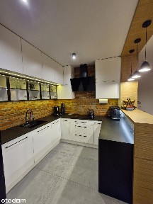 Mieszkanie 90 m² w Mokotowie z dwoma balkonami i garażem.