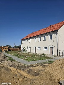 Skrajny szereg 70,23 mkw + antresola 30 mkw, ogród 57 mkw + 60 mkw