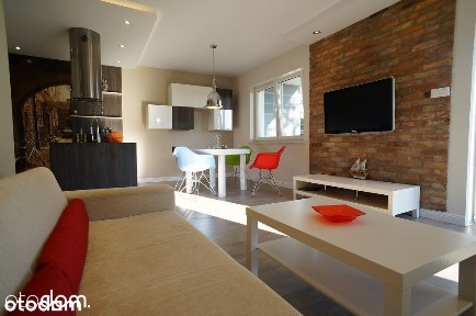 Apartament z ogródkiem i miejscem postojowym