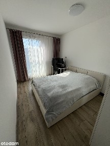 Mieszkanie z balkonem, miejscem w hali i pom. gospodarczym