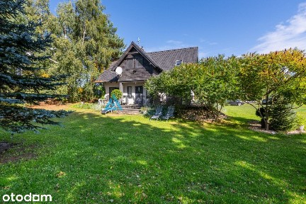 Dom z linią brzegową i dwoma pomostami - Sominy