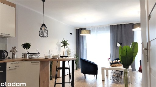 Kawalerka biznesowa 38 m² balkon winda parking Wysoki standard