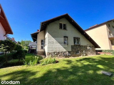 Atrakcyjny dom 220 m2. z ogrodem i garażem.