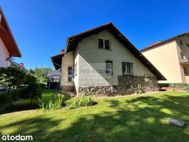 Atrakcyjny dom 220 m2. z ogrodem i garażem.