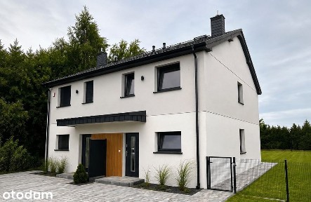 Stylowy dom z ogrodem- komfort i funkcjonalność