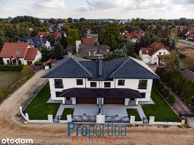 Połówka bliźniaka z garażem na 2 samochody