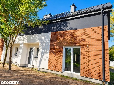Nowoczesny bliźniak 140 m², garaż, działka 506 m²