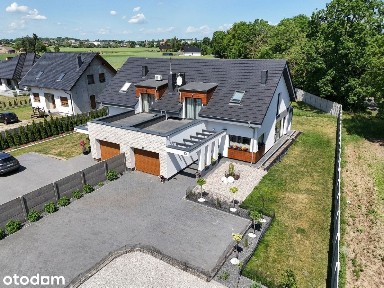Nowoczesny dom w zabudowie bliźniaczej (117 mkw.)