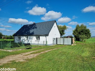 Dom z dużą działką w urokliwej lokalizacji