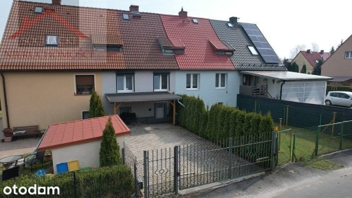 Segment z ogrodem i garażem