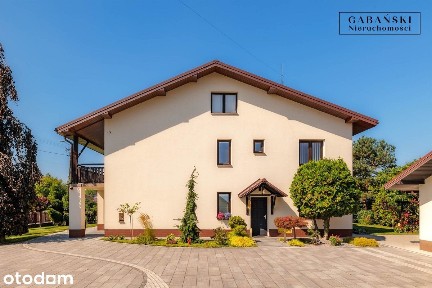 PRZESTRONNY DOM Z DUŻYM GARAŻEM I ZADBANYM OGRODEM - DĄBROWA TARNOWSKA