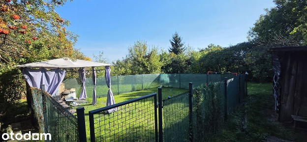 Dwupoziomowe mieszkanie z ogródkiem