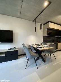 Nowoczesny 2-pok. apartament z balkonem, garażem podziemnym i komórką