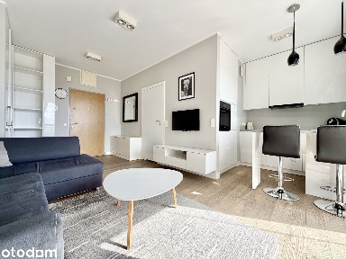 Nowoczesna kawalerka z balkonem i garażem podziemnym w Soho Factory