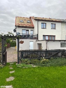 Przestronny dom bliźniak z ogrodem i garażem