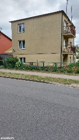 Dom wolnostojący z garażem i budynkiem gospodarczym