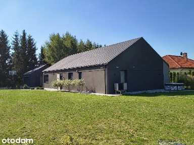 Niskoenergetyczny dom wolnostojący z garażem i dużą działką