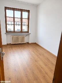 Dom szeregowy z lokalem użytkowym w centrum miasta
