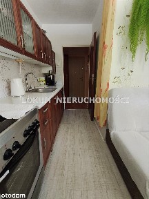 Funkcjonalna kawalerka-parter w niskim bloku