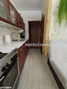 Funkcjonalna kawalerka-parter w niskim bloku