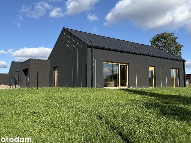 Dom z fotowoltaiką, mag. energii, pergolą i ogrodem I Galewice 129 m²