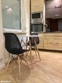 Przestronna kawalerka w nowym apartamentowcu z dużą loggią