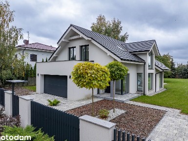 Twój Nowy Luksusowy Dom z Antresolą i Podwójnym Garażem - Baranowo