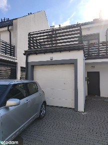 Przytulne skrajne mieszkanie w szeregu z garażem, 15 minut od Poznania