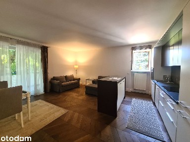 Komfortowe 2 pokoje z (12 m²) tarasem w prestiżowej lokalizacji, garaż