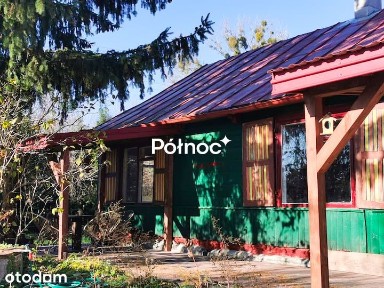 Drewniany dom z sauną w otoczeniu Bugu
