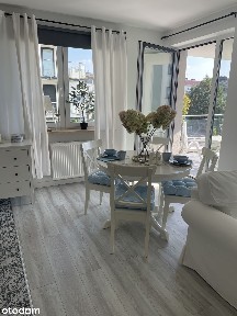 Styl i elegancja, przestronny apartament z tarasem