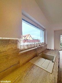 Dom w zabudowie bliźniaczej z garażem w Mierzynie