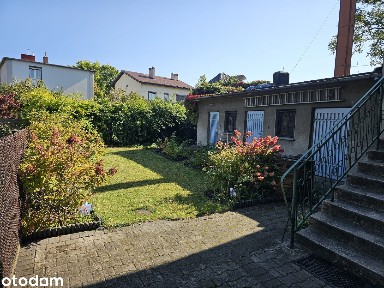 Bliźniak (107 m²) z budynkiem gospodarczym (48 m²) - Ostrów Wlkp.
