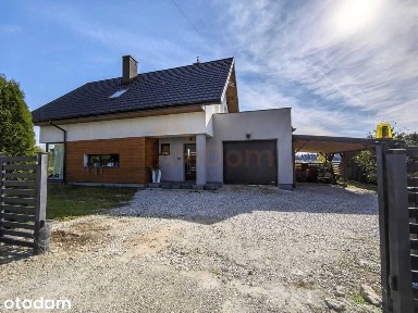 Dom wolnostojący, 129, 99 m², garaż w budynku