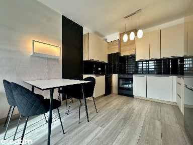 Apartament z miejscem parkingowy oraz pomieszczeniem gospodarczym
