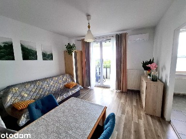 Przytulna kawalerka z balkonem na panoramę Krakowa i klimatyzacją