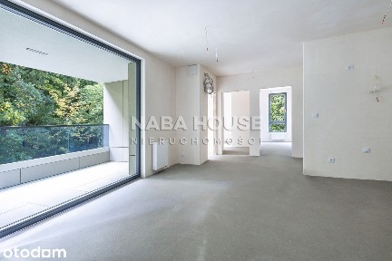 Apartament z tarasem i widokiem na las.