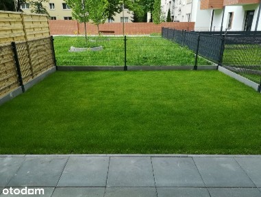 Nowy przestronny apartament z ogródkiem i garażem