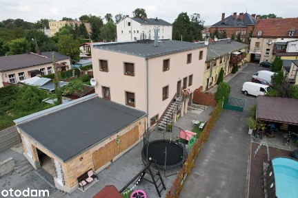 Dom • 3 mieszkania • lokal usługowo - handlowy • garaż