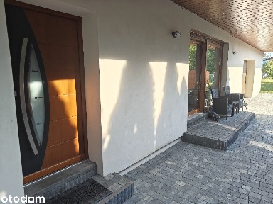 Dom z garażem ogrodem fotowoltaika pompa ciepła blisko centrum