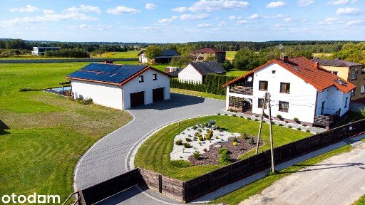 Komfortowy dom z pełnym zapleczem rekreacyjnym na widokowej działce.