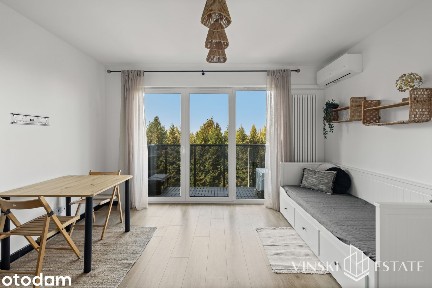 Nowa kawalerka z balkonem i widokiem na drzewa